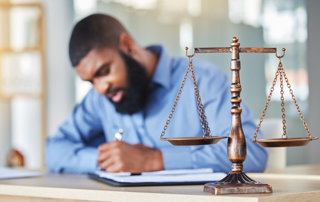 car accident attorney at desk hampton and hampton law